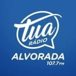 Logo da rádio Tua Rádio Alvorada 107.7 FM ao vivo online